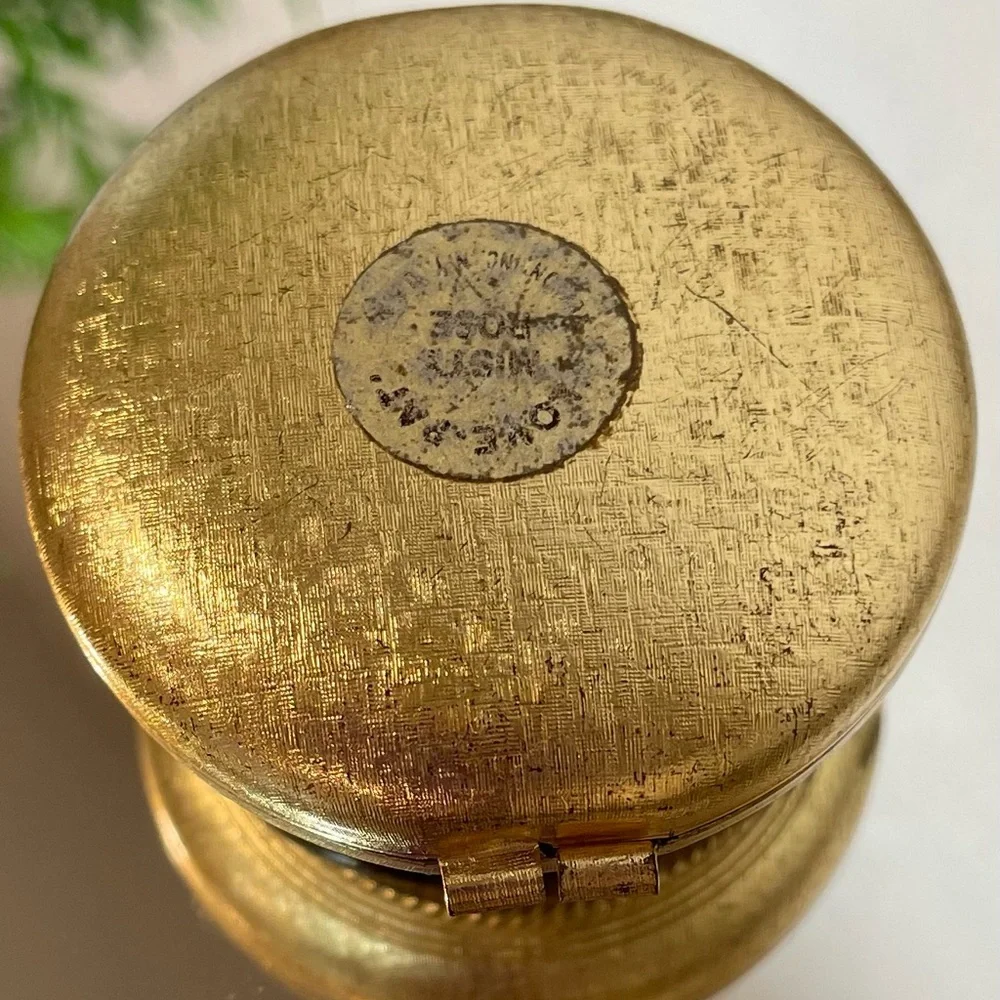 Vintage Revlon “Love Pat” Gold-tone Powder Compact with Burgundy Velvet Accent.